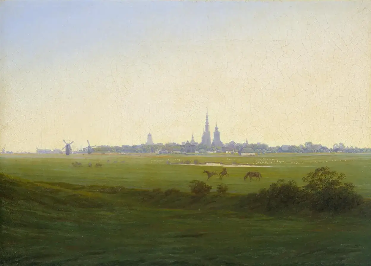 Eine weite gr&uuml;ne Landschaft mit Pferden und Schafen, im Hintergrund eine Stadt mit Kircht&uuml;rmen und Windm&uuml;hlen. Ein typisches Motiv f&uuml;r eine Caspar David Friedrich Ausstellung.